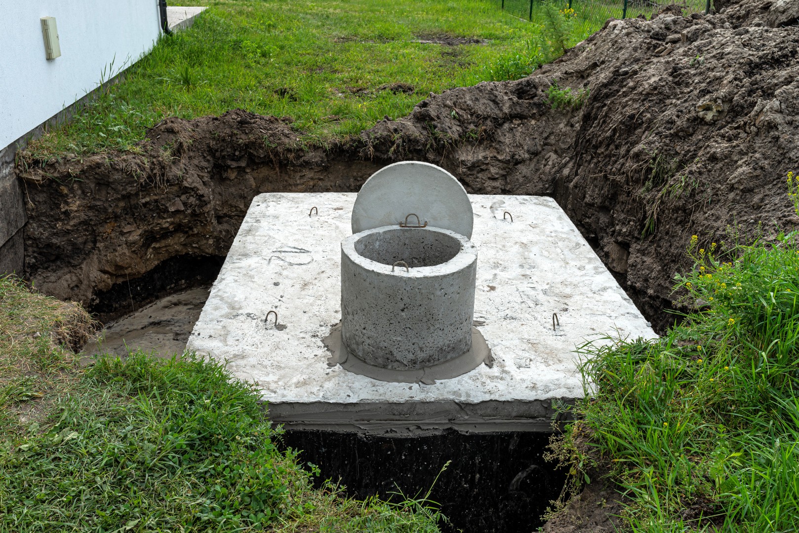 concrete septic tank installed in the ground